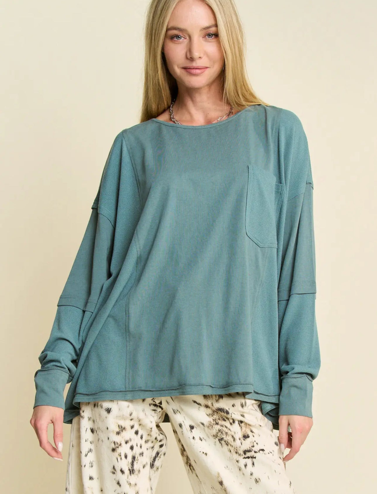 Exposed Seam Loose Fit Long Sleeve
Knit Top