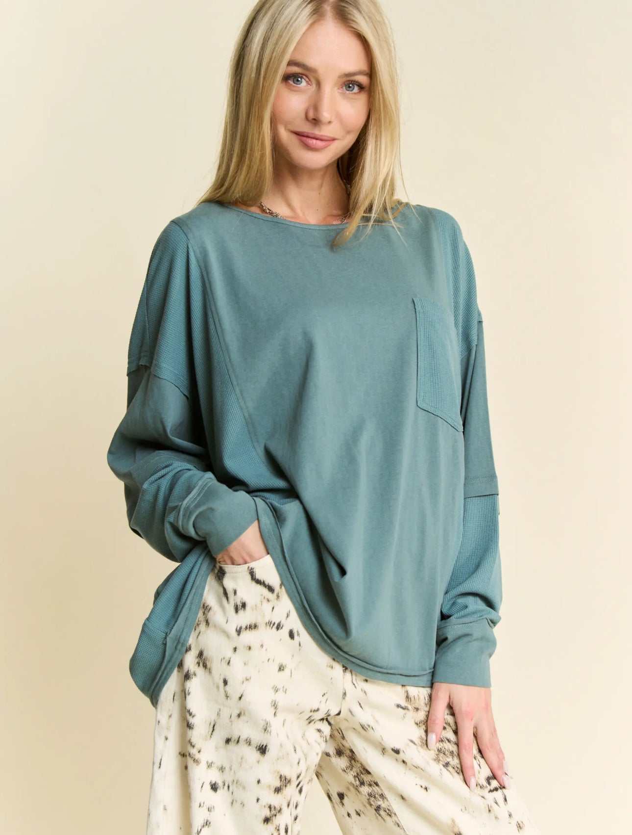 Exposed Seam Loose Fit Long Sleeve
Knit Top