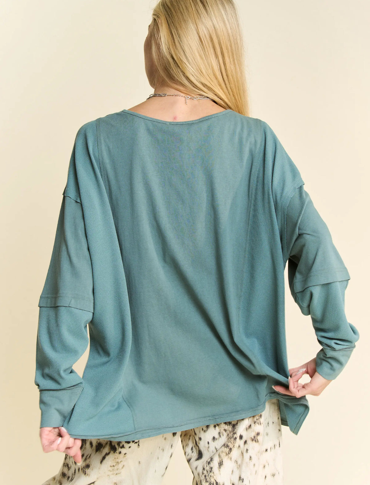 Exposed Seam Loose Fit Long Sleeve
Knit Top