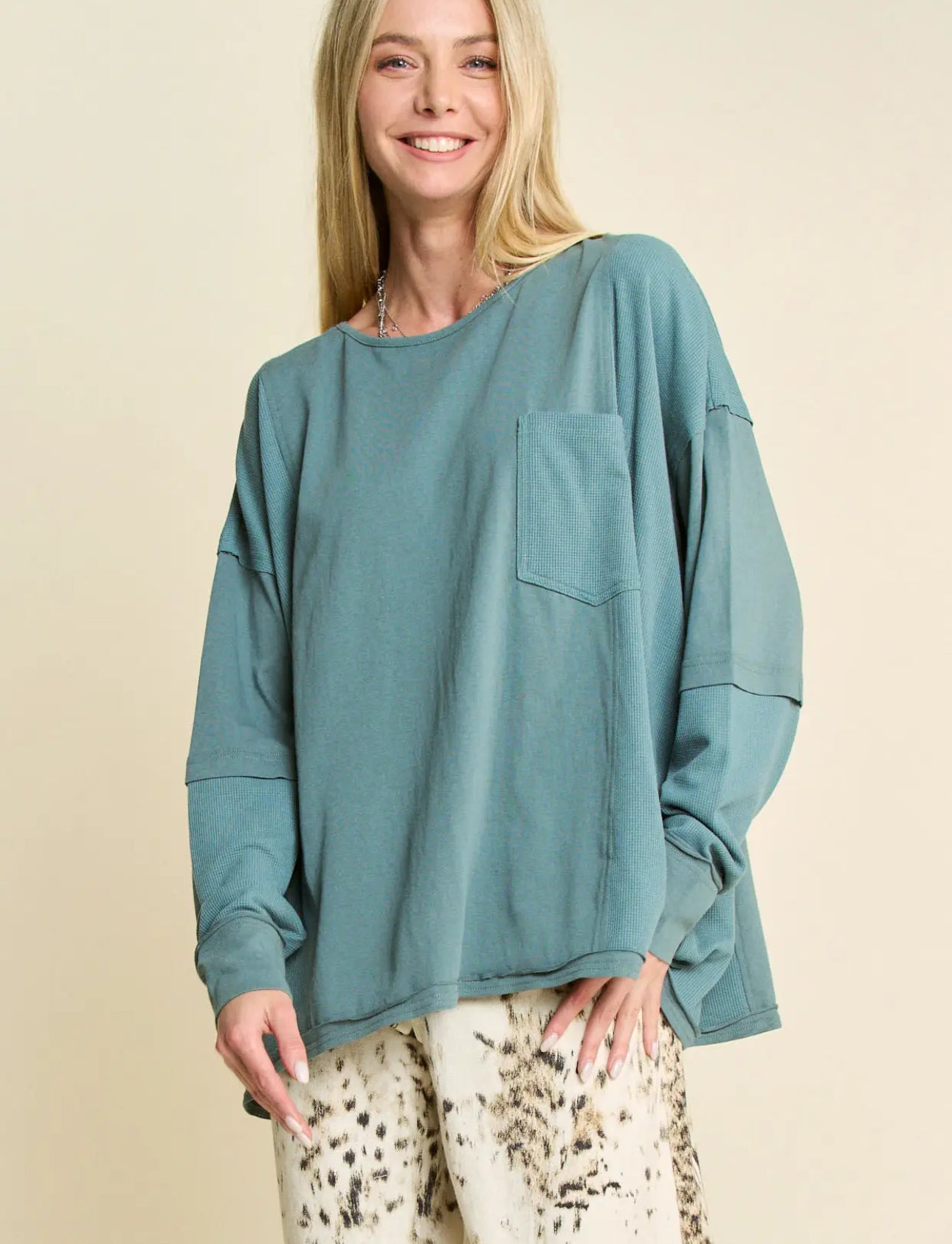 Exposed Seam Loose Fit Long Sleeve
Knit Top